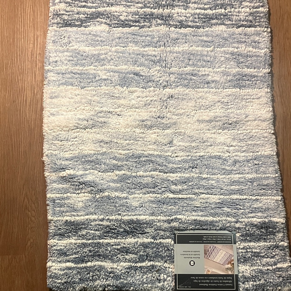 Blue and White Striped Rug